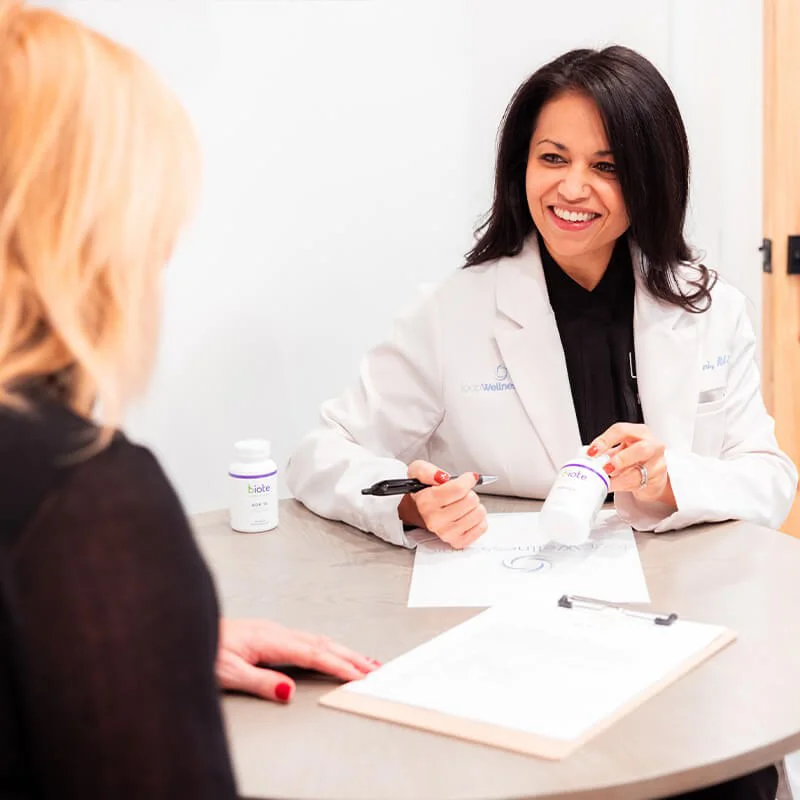 Loop Wellness Clinic provider consulting with a hormone therapy patient