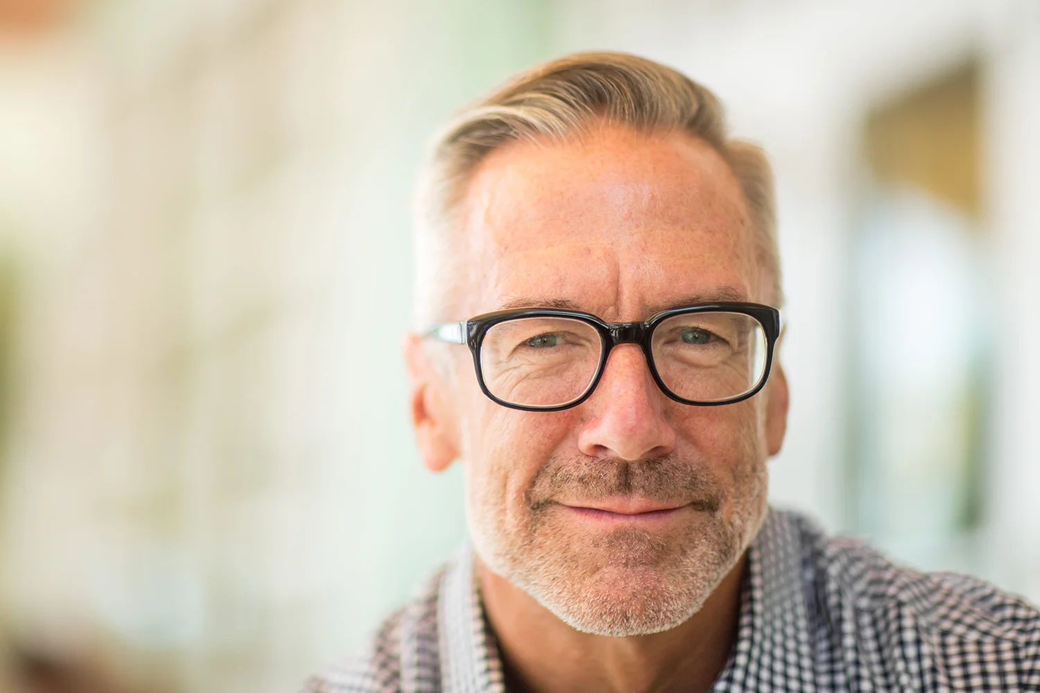 Smiling man in his 40s or 50s
